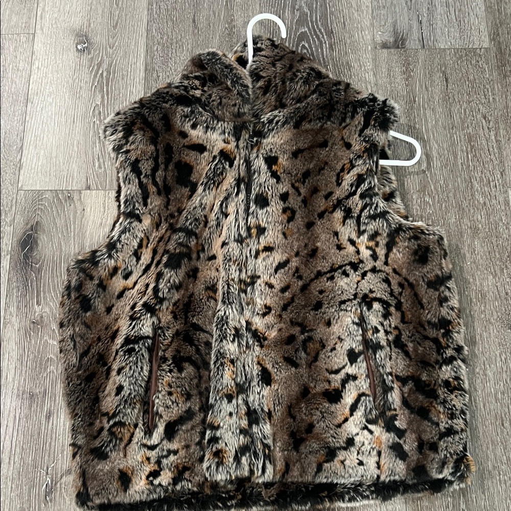 Faux fur vest with hood